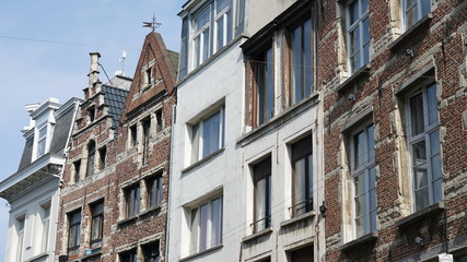 Fototapeta na wymiar Different old houses in a street in Antwerp, Belgium.