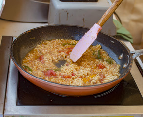 Cooking noodles in pan