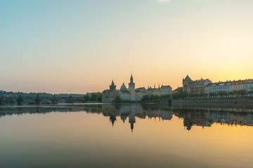 Fototapeta na wymiar Prague, Charles Bridge and the old building by the River in the morning