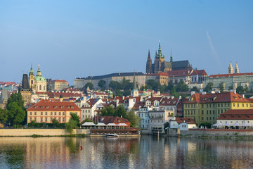 Prague, old buildings along the River over the Charles Bridge