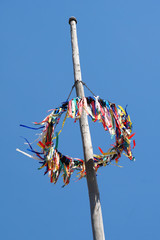 traditional german maypole against blue sky