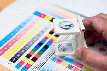 Printing Thread Counter Being Used by Male Hand Measurement Color Management Industry Object
