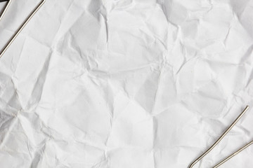 close up of a stack of papers and paper clip