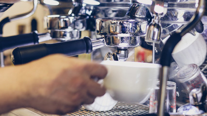 Asian men Barista using coffee machine in coffee shop counter - Working woman small business owner food and drink cafe concept