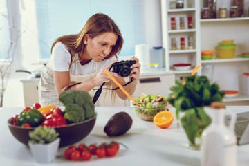 Obraz na płótnie Canvas Food Blogger Focused On Work