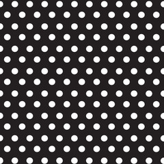 White dots polka on black background seamless pattern