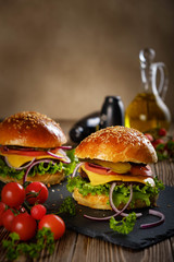 Hamburger with cutlet and cheese.