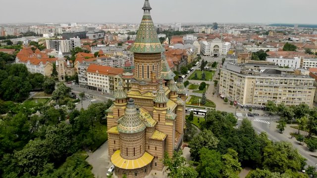 Aerial footage from Timisoara, Romania taken by a professional drone in 4K - Timisoara Orthodox Cathedral in middle.