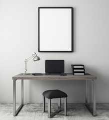Contemporary interior with laptop and poster