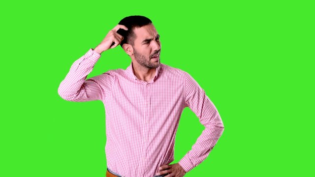 Confused young man posing - Chroma background