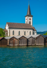 The charming village of Busskirch (Kirchdorf), Rapperswil-Jona, Sankt Gallen, Switzerland. Located in an idyllic lakeside shore of the Obersee (Upper Lake Zurich)