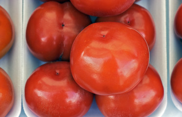 Stacks of persimmon symmetrically organized