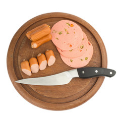 sausages on chopping  board on isolated on white background