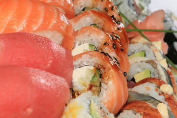 A large set of sushi rolls