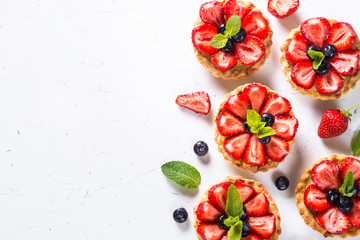 Strawberry tart on white.