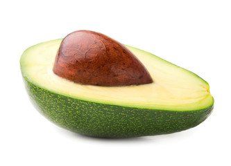 single half of avocado with seed isolated on white background