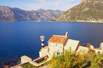 Beautiful autumn Mediterranean landscape. Montenegro, view of Bay of Kotor, Church of Our Lady of...