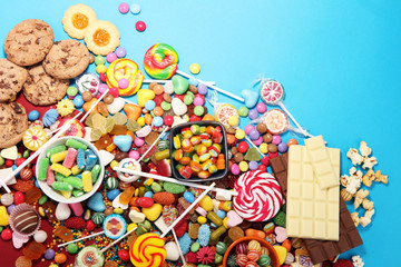 candies with jelly and sugar. colorful array of different childs sweets and treats