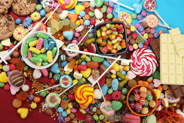 Fototapeta na wymiar candies with jelly and sugar. colorful array of different childs sweets and treats