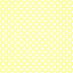 Seamless pattern. White polka dot on the yellow background