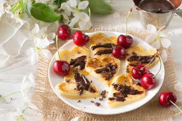Pancakes hearts with cherries