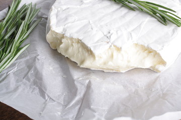 cheese brie wooden background rosemary