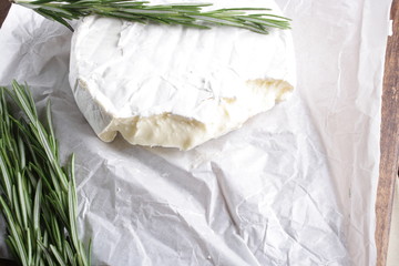 cheese brie wooden background rosemary