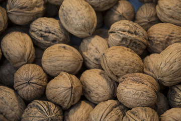 walnuts with peel giving a natural pattern of abstract texture