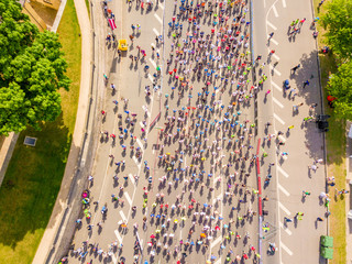 International Marathon Lattelecom 2018. Start on the embankment and people running by the Daugava...