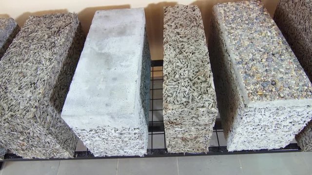 commercial warehouse of cement blocks and wood chips at the plant