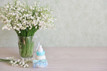 decorative baby bottle with milk are on the table. For a baby shower celebrate. for thematic birthday decor