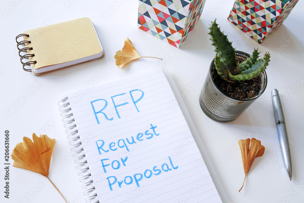 Poster rfp request for proposal written in notebook on white table