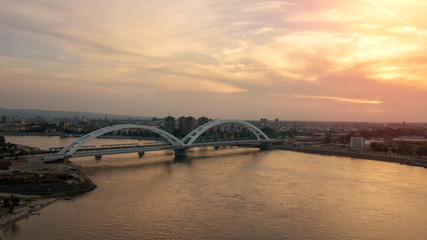 Naklejka premium Beautiful drone shot of Novi Sad bridge at sunset