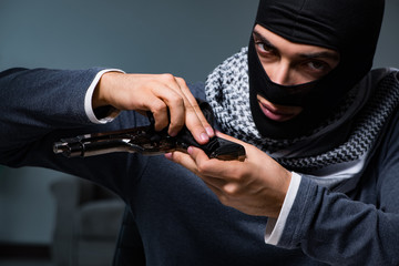 Terrorist burglar with gun asking for money ransom