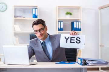 Businessman in positive yes answer in the office
