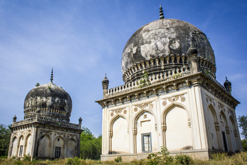 Two Beautiful Tombs Showcasing Traditional Mughal Architecture at the Qutb Shahi Tombs in Hyderabad, India