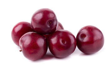 Red cherry plum isolated on white background