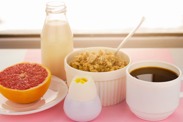 healthy foods for breakfast, milk, cereal, coffee, soft boiled egg , grapefruit