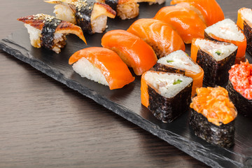 japanese cuisine, sushi set on a board