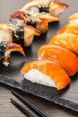 japanese cuisine, sushi set on a board