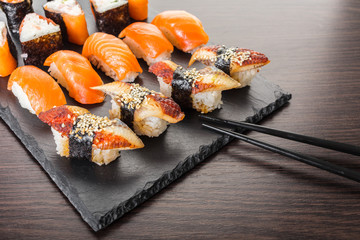 japanese cuisine, sushi set on a board