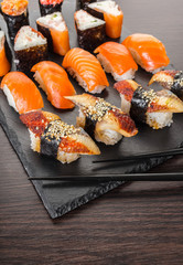 japanese cuisine, sushi set on a board