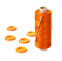 spool of thread and buttons