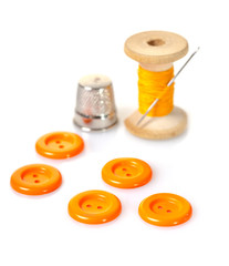 spool of thread and buttons