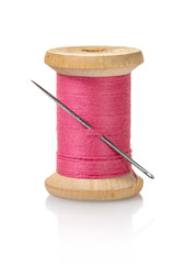 spool of pink threads