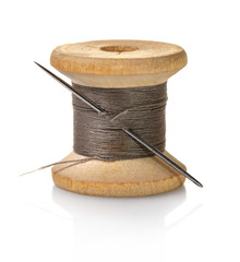 spool of brown threads