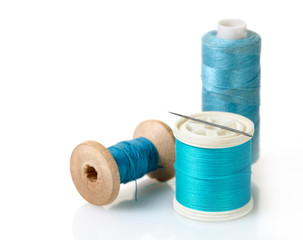 spool of blue threads