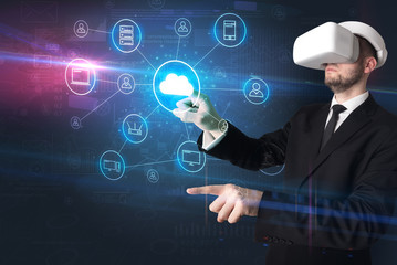 Businessman in vr glasses organize lifesize projected social media concept
