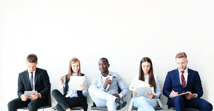 Stressful people waiting for job interview.
