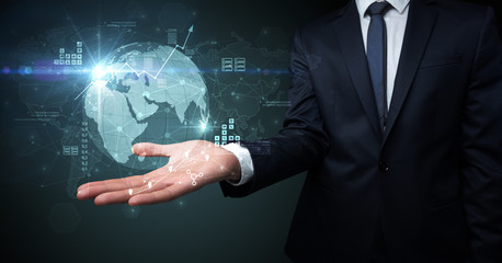 Businessman handing transparent global information flow concept on his hand